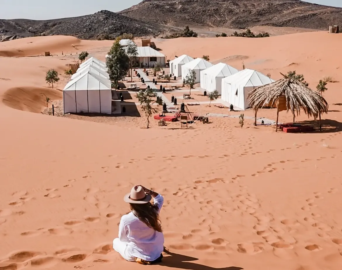 Luxury white tents at a Sahara desert camp